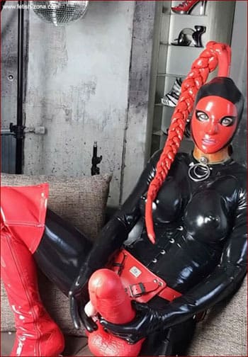 Rubber Queen Ana-Lucia shows off her strap-ons